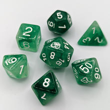 Load image into Gallery viewer, Semi transparent green dice with a mix of light to dark green pattern and slight glitter. White Font with Talys Dragon. 7 Piece Standard Size Dice Set