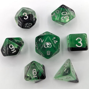 One third Solid black layer with green transparent nebula pattern creates the smoke for the cauldron. Silver Font with Talys Dragon. 7 Piece Standard Size Dice Set