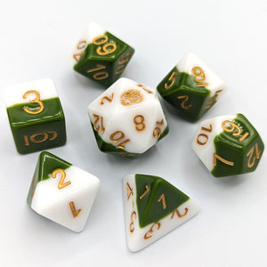 Solid cream white layer and medium green layer. Gold font with Talys Dragon. 7 Piece Standard Size Dice Set