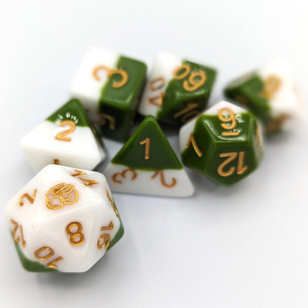 Solid cream white layer and medium green layer. Gold font with Talys Dragon. 7 Piece Standard Size Dice Set