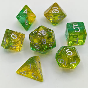 Transparent light green lime layer and light yellow transparent lemon layer with silver glitter throughout. Silver font with Talys Dragon. 7 Piece Standard Size Dice Set
