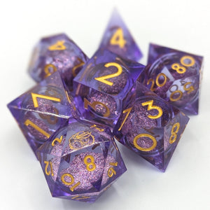 purple set with dark pink sand liquid core with a special D4 and gold font. 