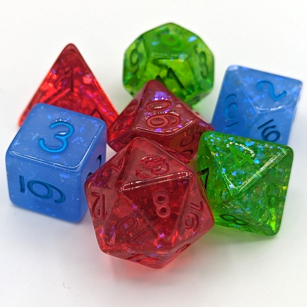 Single color transparent red with red glitter D20, D00, and D4. Single color transparent blue with blue glitter D10 and D6. Single color transparent green with green glitter D12 and D8. Matching color fonts for each dice with Talys Dragon. 7 Piece Standard Size Dice Set