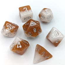 Load image into Gallery viewer, White solid shimmer layer and caramel solid shimmer layer. Silver font with Talys Dragon. 7 Piece Standard Size Dice Set