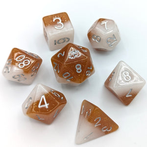 White solid shimmer layer and caramel solid shimmer layer. Silver font with Talys Dragon. 7 Piece Standard Size Dice Set