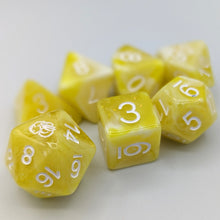 Load image into Gallery viewer, White and bright yellow marble pattern with shimmer. White font with Talys Dragon. 7 Piece Standard Size Dice Set