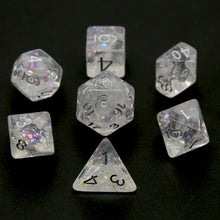 Load image into Gallery viewer, Clear dice with nebula white swirls and glitter inside creating a snow globe effect. Silver font with Talys Dragon. 7 Piece Standard Size Dice Set