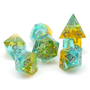 Transmutation light blue and gold yellow layered dice with silver font